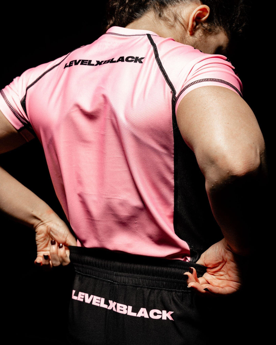 Pink Competitor: worn, back view
